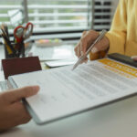 Business owners discussing company setup and compliance in Malaysia