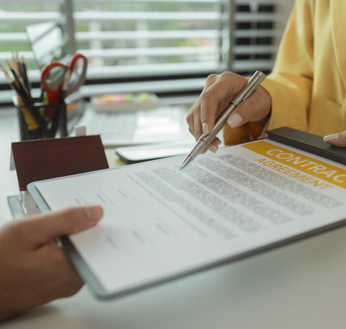 Business owners discussing company setup and compliance in Malaysia